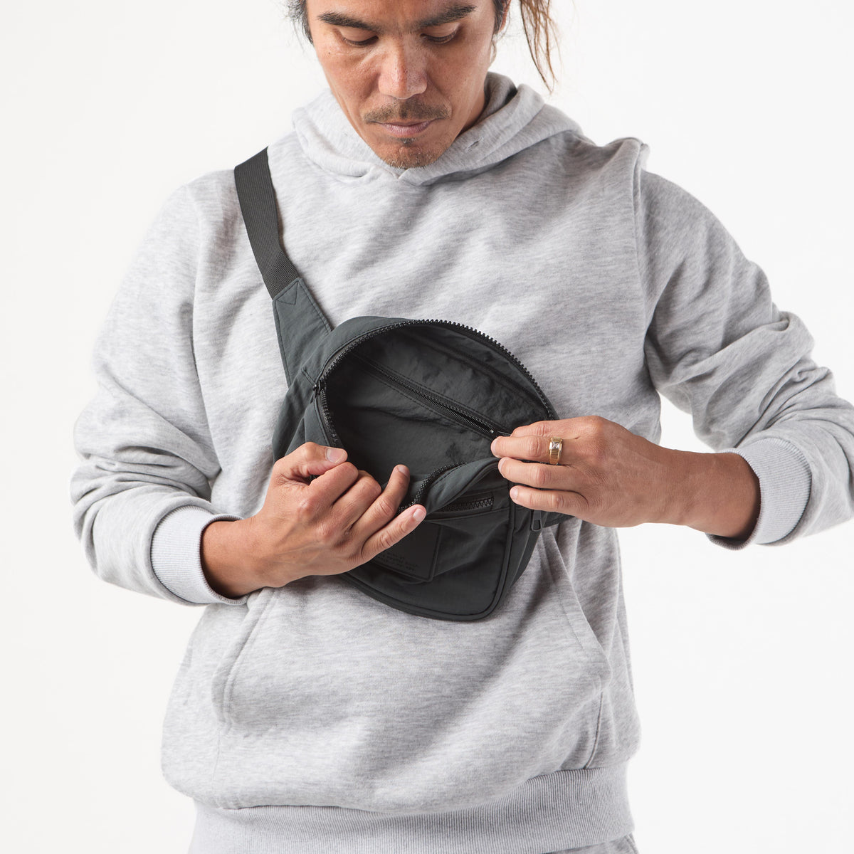 Holomua Keep It Light Hip Pack in Sand on Black