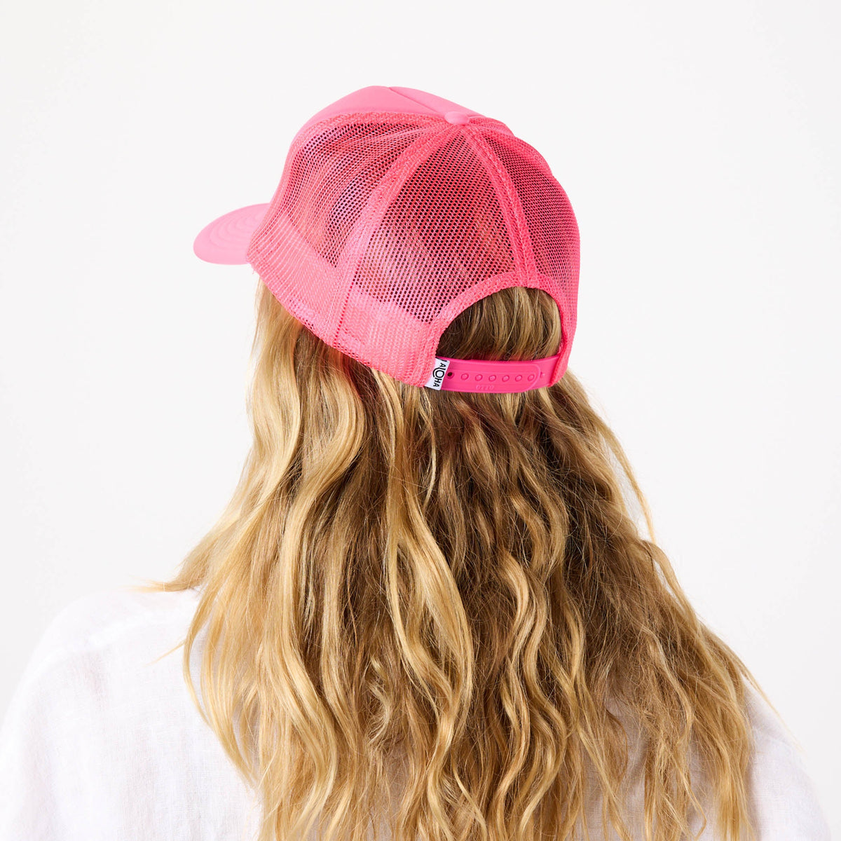 ALOHA Foam Trucker Hat in Lavande on neon Pink
